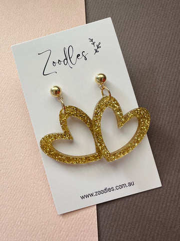 Zoodles Acrylic Dangles - Gold Glitter Hearts